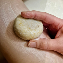 Hand lathering a bar of Handcrafted French Soap