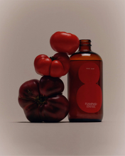 Flamingo Estate Roma Heirloom Tomato Liquid Hand Soap and fresh tomatoes