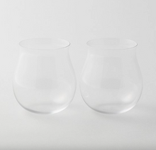 A pair of Burgundy style glasses in plain background. 