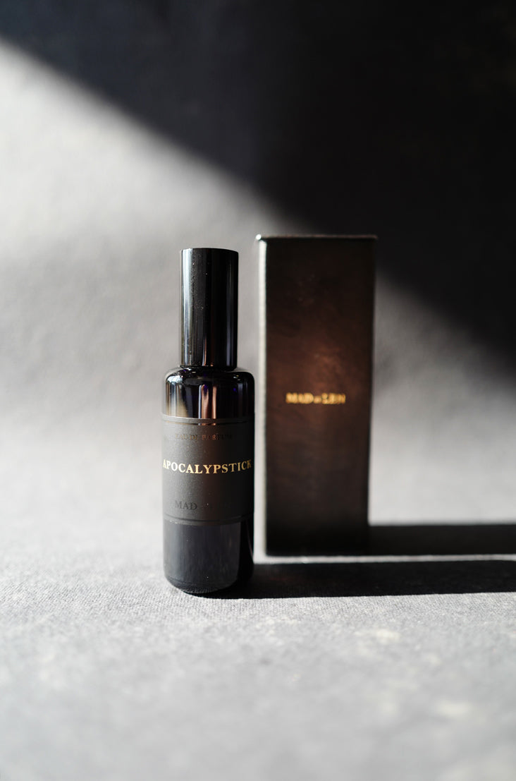 Mad et Len Eau de Parfum with signature black metal packaging. 