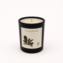 Candle in a black container with 'Hyperion' branding on a white background