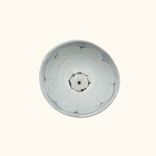 Bowl with floral pattern on white background