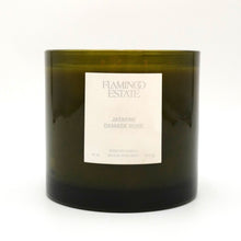 Flamingo Estate Jasmine Damask Rose candle with a white label on a white background
