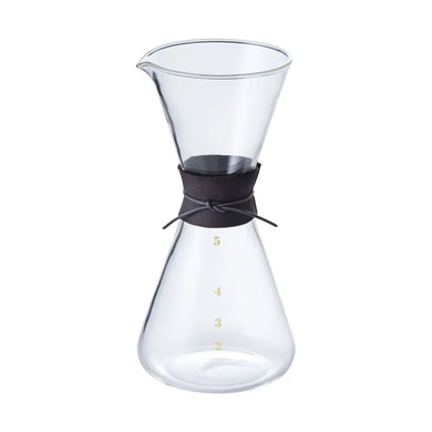 Clear glass coffee maker with deer skin  band on a white background