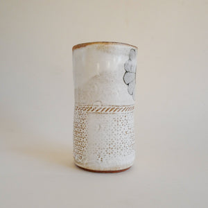 Spako Clay vase single flower and textile texture