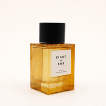 Perfume bottle with 'Eight & Bob' label on a white background