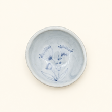 Spako Clay ceramic dish with blue floral pattern on a white background