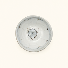 Spako Clay ceramic dish with floral pattern on a white background
