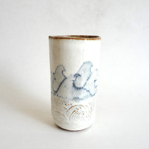 Spako Clay tumbler blue line drawing of waves and emboss pattern, white glaze