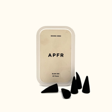 Incense cones with a container labeled 'APFR' on a white background