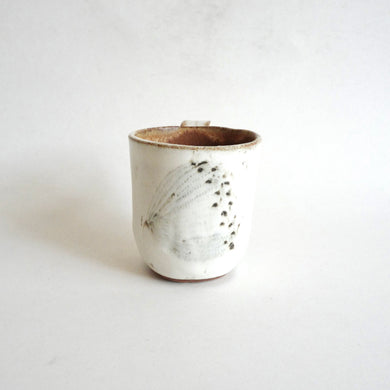 Spako Clay mug. Black line wildflower drawing, white glaze