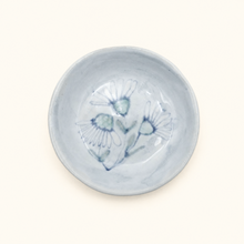 Spako Clay Small white ceramic dish with blue floral design on a white background