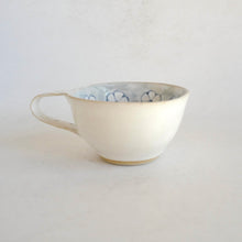 Cappuccino mug on beige background