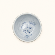 Spako Clay ceramic dish with blue floral pattern on a white background