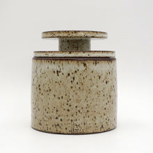 MH Ceramic Studio Speckled ceramic jar with lid on a white background