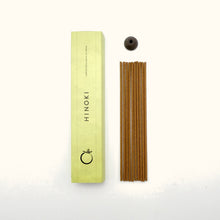 Hinoki incense sticks with a green box on a white background