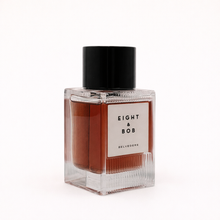 Perfume bottle with 'Eight & Bob' label on a white background
