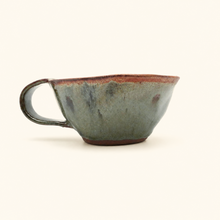 Spako Clay cappuccino mug with a handle on a white background