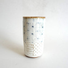 Spako Clay tumbler blue line drawing and emboss pattern, white glaze