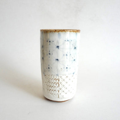 Spako Clay tumbler blue line drawing and emboss pattern, white glaze