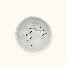 Spako Clay ceramic dish with floral pattern on a white background