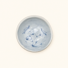 Spako Clay ceramic dish with blue floral pattern on a white background