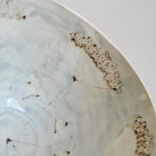 Close-up of a ceramic plate with floral design