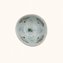 Bowl with floral pattern on white background