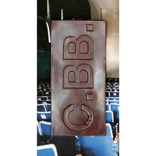 Chocolate bar with image of movie theater on white backgound