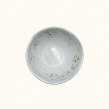 Bowl with floral pattern on white background