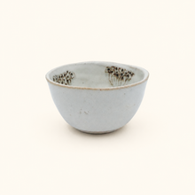 Bowl with floral pattern on white background