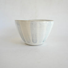 White ceramic bowl on a white background