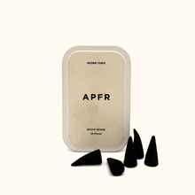 Incense cones with packaging labeled 'APFR' on a white background