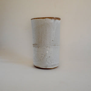 Spako Clay vase and textile / floral texture