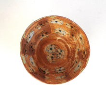 Ceramic bowl with floral patterns on a white background