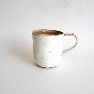 Spako Clay mug. Black line wildflower drawing, white glaze