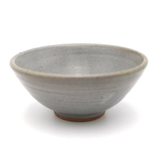 Gray ceramic bowl on a white background