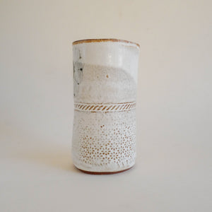 Spako Clay vase single flower and textile texture