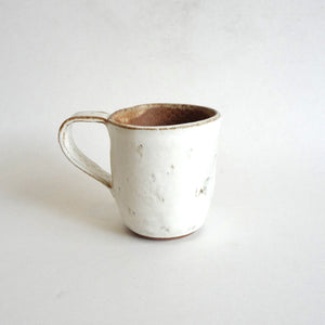 Spako Clay mug. Black line wildflower drawing, white glaze