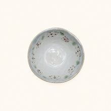 Bowl with floral pattern on white background
