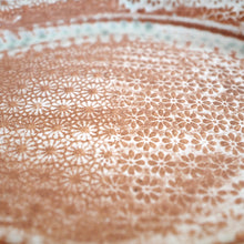 Close-up of a textured surface with a subtle pattern