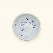 Spako Clay ceramic dish with blue floral pattern on a white background
