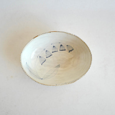 Ceramic bowl with floral design on a white background