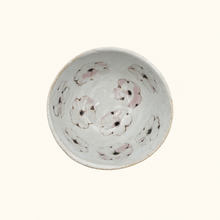 Bowl with floral pattern on white background