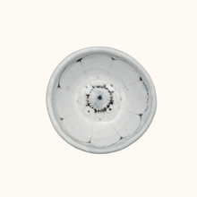 Spako Clay ceramic dish with floral pattern on a white background