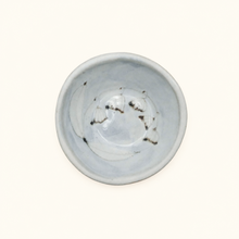 Spako Clay ceramic dish with floral pattern on a white background