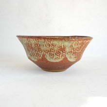 Ceramic bowl with floral pattern on a white background
