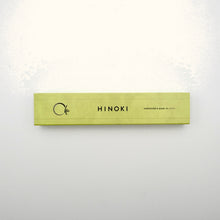 Long rectangular wooden product with 'Hinoki' branding on a light gray background