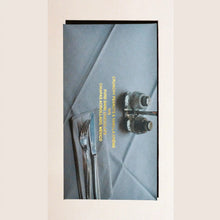 Chocolat bar packaging with image of dinner table - gold type printing