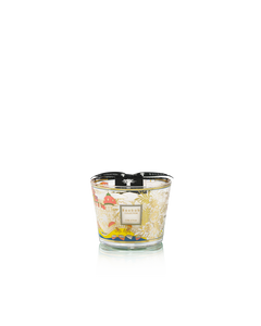 Decorative candle with floral design on a white background